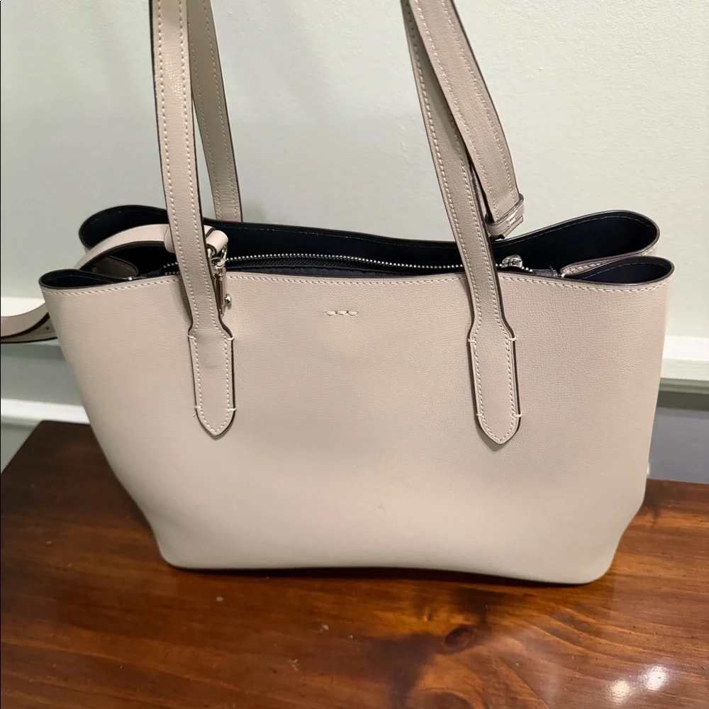 Large Coach handbag.  Purple/ grey color